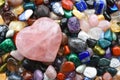 Chakra Healing Crystals and Heart Shaped Rose Quartz Crystal Royalty Free Stock Photo