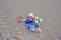 Chakra stones on wet sand Royalty Free Stock Photo