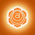 Chakra swadhisthana. Orange shining yoga symbol. Om sign. Sacral icon