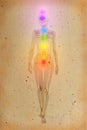 Chakras over a human body Royalty Free Stock Photo