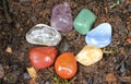 Chakras Stones to Heal stands on the earth to renovate energies Royalty Free Stock Photo
