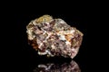 Chalcopyrite copper ore, raw rock on black background, mining and geology Royalty Free Stock Photo