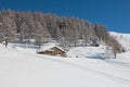 Chalet covered by snow in italian alps Royalty Free Stock Photo