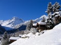 Chalets in a snow white valley Royalty Free Stock Photo