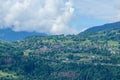 The chalets in the town of Combloux in the Mont Blanc Massif in Europe, France, the Alps, towards Chamonix, in summer, on a cloudy Royalty Free Stock Photo