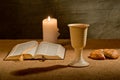 Chalice of wine and bible Royalty Free Stock Photo