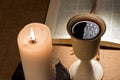 Chalice of wine and bible Royalty Free Stock Photo