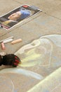 Chalk Artist Sketches Portrait Onto Sidewalk