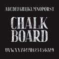 Chalk board alphabet font. Hand drawn type letters and numbers on a dark background. Royalty Free Stock Photo