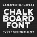 Chalk board alphabet font. Messy type letters and numbers on a dark background. Royalty Free Stock Photo