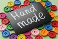 Chalk Board with the inscription `manual discount` surrounded by colorful wooden buttons Royalty Free Stock Photo