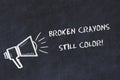 Chalk board sketch with loudspeaker and motivational phrase broken crayons still color Royalty Free Stock Photo