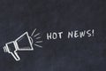 Chalk board sketch with loudspeaker and phrase hot news Royalty Free Stock Photo