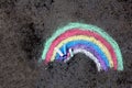 Chalk drawing on asphalt: colorful rainbow Royalty Free Stock Photo