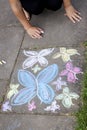 Chalk drawing of butterflies on sidewalk Royalty Free Stock Photo