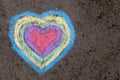 Chalk drawing: colorful hearts on asphalt Royalty Free Stock Photo
