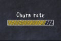 Chalk drawing of loading progress bar with inscription churn rate