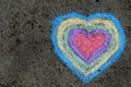 Chalk drawing: colorful hearts on asphalt Royalty Free Stock Photo