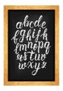 Chalk hand drawn latin calligraphy brush script of lowercase letters on the blackboard. Calligraphic alphabet. Vector Royalty Free Stock Photo