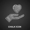 Chalk Heart in hand icon isolated on black background. Hand giving love symbol. Valentines day symbol. Vector