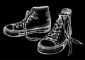 Chalk illustration of sneakers on a blackboard Royalty Free Stock Photo