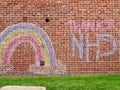 Chalk painting rainbow and Thanks NHS on the wall