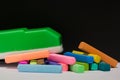 Chalk pastels and green blackboard eraser Royalty Free Stock Photo