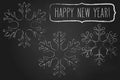 Chalk snowflakes frame and New Year greetings Royalty Free Stock Photo