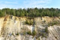 Chalk structure on artificial mountain after quarry mining. Technogenic rock formed during mine. Mountain hill with chalk fossil