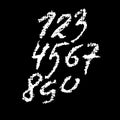 Chalk textured numbers. Grunge digits on chalkboard. Vector calligraphy illustration.