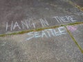 Sidewalk Chalk Writing Hand in There Seattle in a Neighborhood Royalty Free Stock Photo