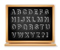 Chalkboard alphabet set on wooden blackboard