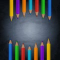 Chalkboard background with colorful pencils Royalty Free Stock Photo