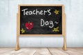 Chalkboard celebrating Teacher's Day with stars