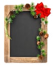 Chalkboard with christmas decoration and red ribbon bow