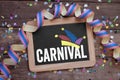 Chalkboard with confetti and streamers with carnival