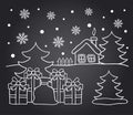 Chalkboard drawing of winter house and Christmas gifts
