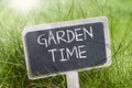 Chalkboard with garden time Royalty Free Stock Photo