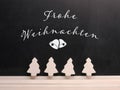 Chalkboard with the German inscription Merry Christmas Royalty Free Stock Photo