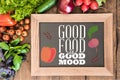 Chalkboard with group of fresh vegetables Royalty Free Stock Photo