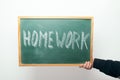 Chalkboard with HOMEWORK handwritten in chalk Royalty Free Stock Photo