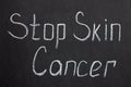 Chalkboard lettering stop skin cancer