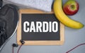 Chalkboard and sport equipment with cardio-training