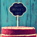 Chalkboard with the text happy mothers day on a cake