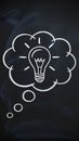 Chalkboard Thought Cloud with Lightbulb Illustration in White Chalk Royalty Free Stock Photo