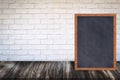 Chalkboard wood frame blackboard sign menu on wooden table Royalty Free Stock Photo