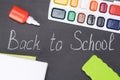 On the chalkboard written back to the school with chalk and objects for creativity Royalty Free Stock Photo