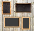 Chalkboards on the wood wall Royalty Free Stock Photo