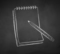Chalked illustration of notepad with pencil