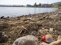 Chalkida, Evia island. July 2019: Panoramic view of the city beach of Liani Ammos with tourists and Gypsies, polluted with garbage